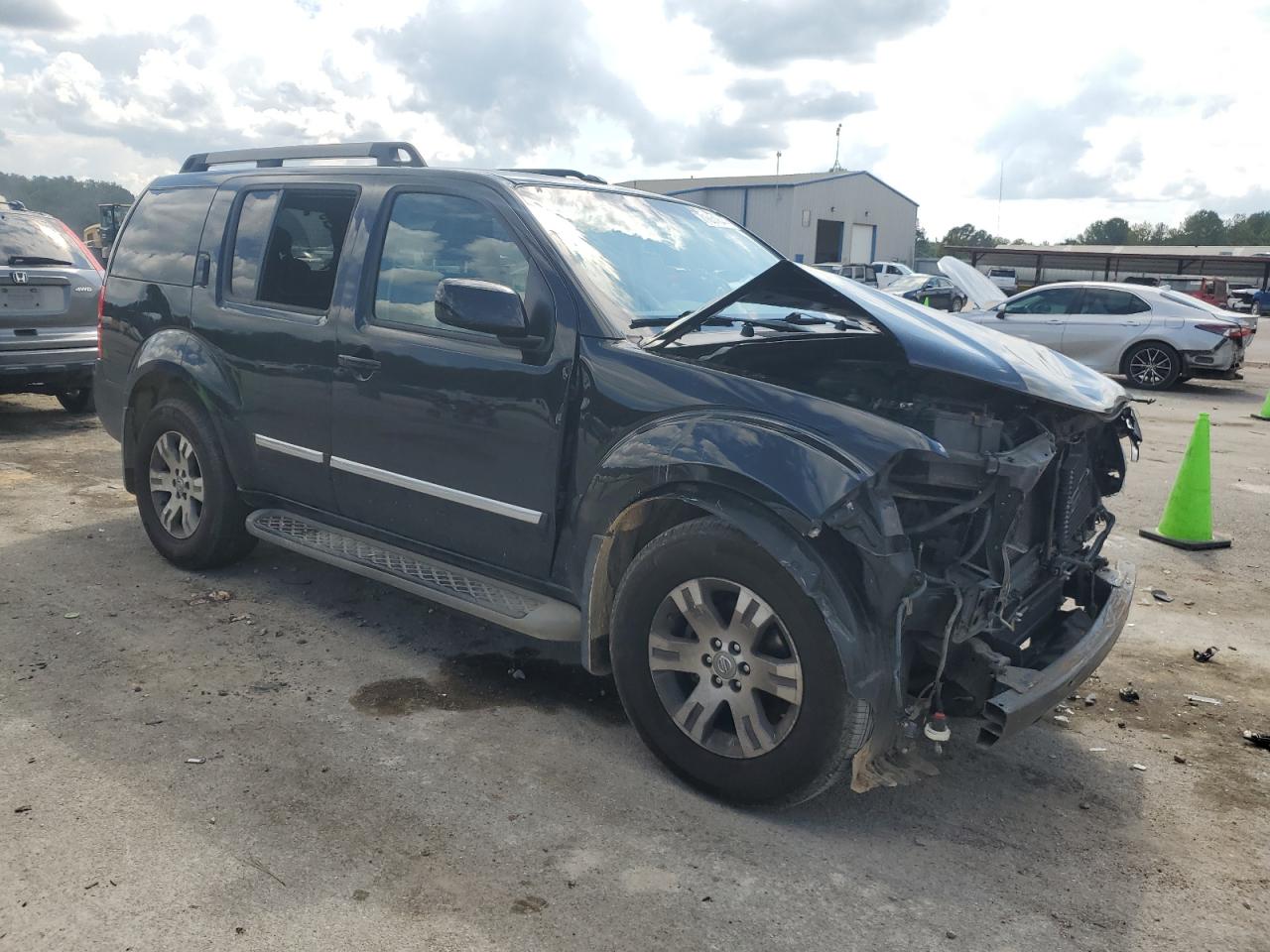 2011 Nissan Pathfinder VIN 5N1AR1NN5BC630792 Copart auction photo, front end / minor dent/scratches damage thumbnail 4