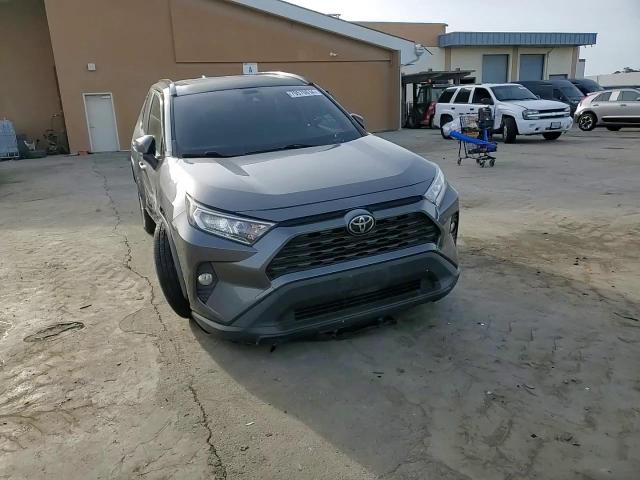 2019 Toyota RAV 4 VIN JTMW1RFV3KD003453 Copart auction photo, side / front end damage thumbnail 11