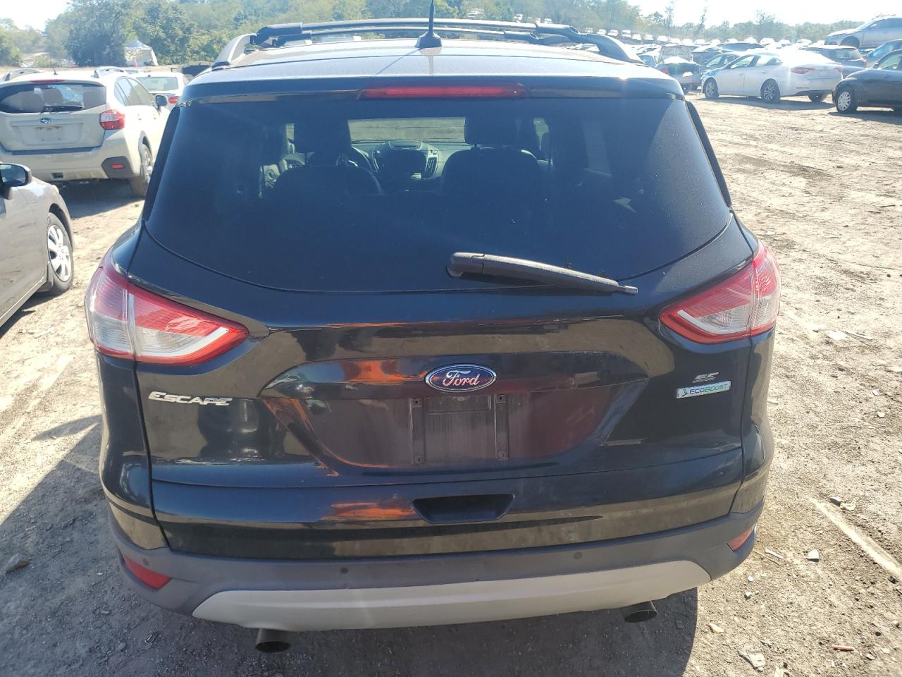 2014 Ford Escape VIN 1FMCU0GX0EUB20218 Copart auction photo, minor dent/scratches damage thumbnail 6