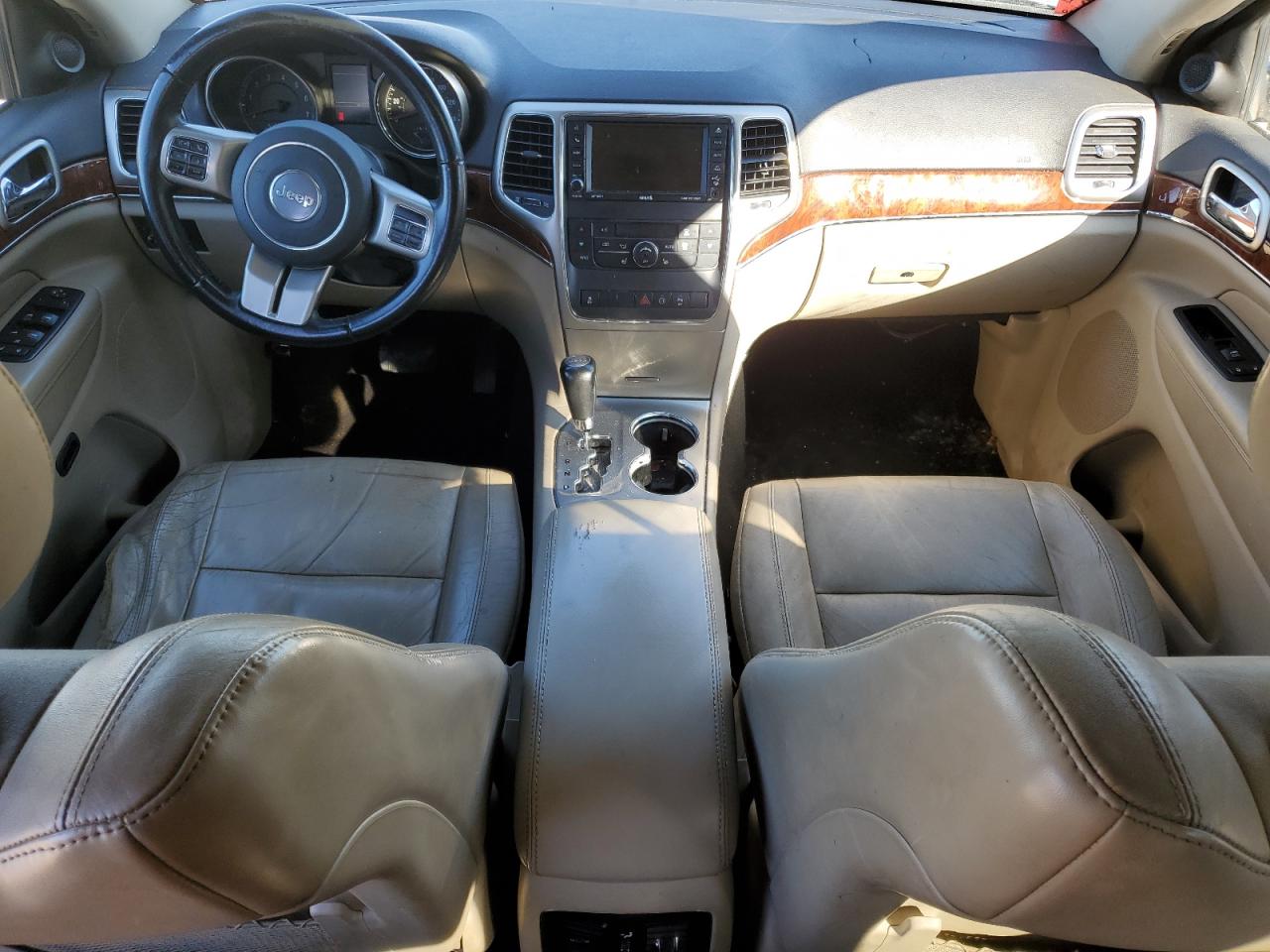 2012 Jeep Grand Cherokee VIN 1C4RJEBGXCC230207 Copart auction photo, side / damage history damage thumbnail 8