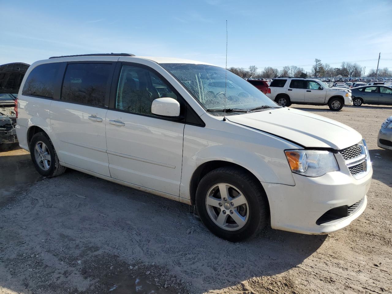 2012 Dodge Caravan VIN 2C4RDGCG2CR329886 Copart auction photo, front end / minor dent/scratches damage thumbnail 4