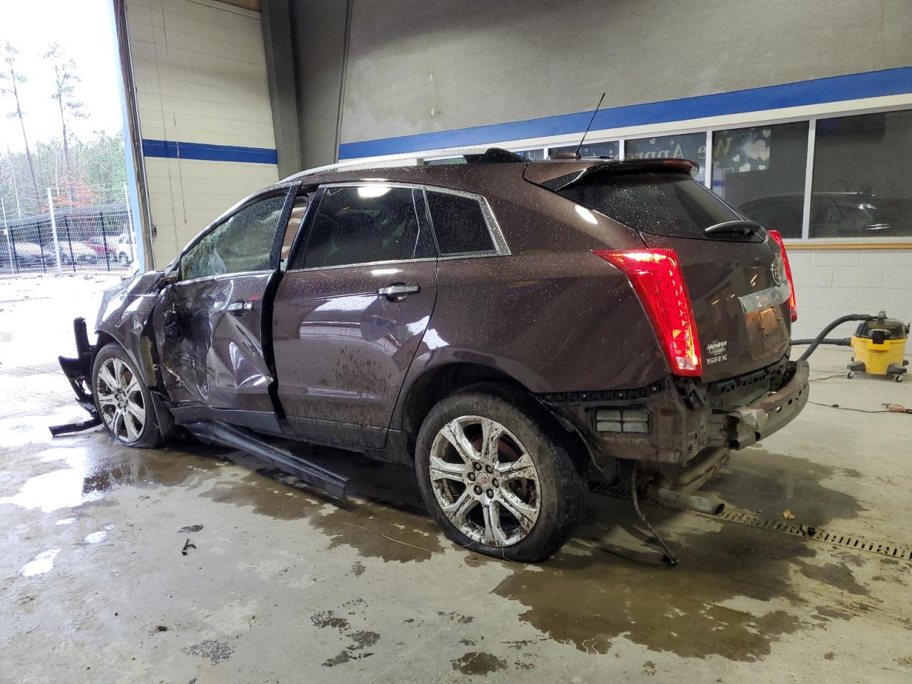 2016 Cadillac SRX VIN 3GYFNCE31GS571798 Copart auction photo, all over damage thumbnail 2