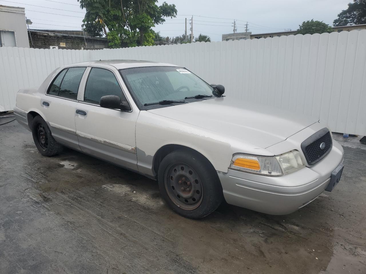 2011 Ford Crown Victoria VIN 2FABP7BVXBX123711 Copart auction photo, minor dent/scratches damage thumbnail 4