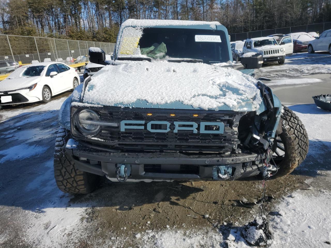 2023 Ford Bronco VIN 1FMEE5JR7PLB91020 Copart auction photo, front end damage thumbnail 5
