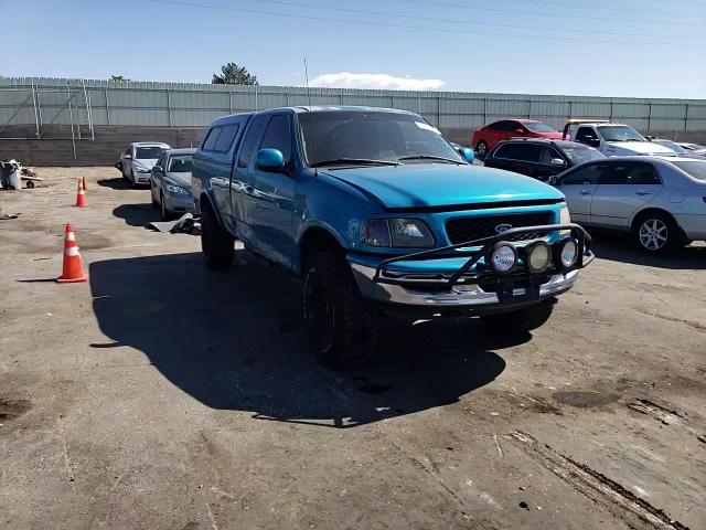 1998 Ford F-150 VIN 1FTRX18L8WKB89808 Copart auction photo, side damage thumbnail 10
