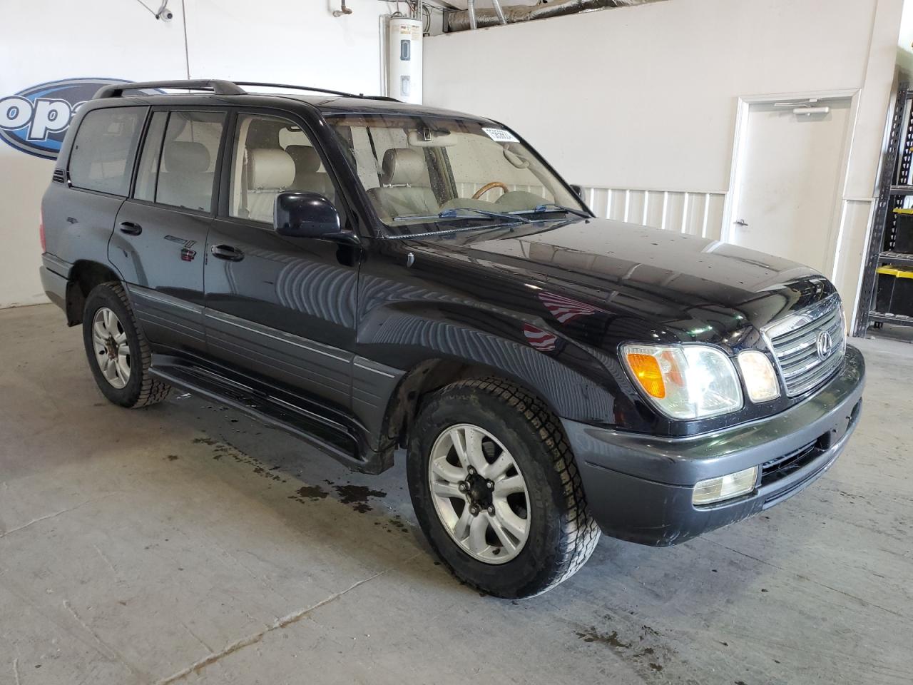 2003 Lexus LX VIN JTJHT00W533531886 Copart auction photo, minor dent/scratches damage thumbnail 4