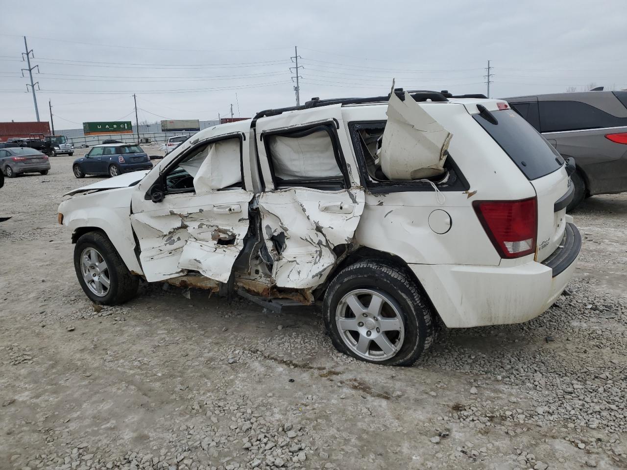 2009 Jeep Grand Cherokee VIN 1J8GR48K89C525250 Copart auction photo, all over / undercarriage damage thumbnail 2