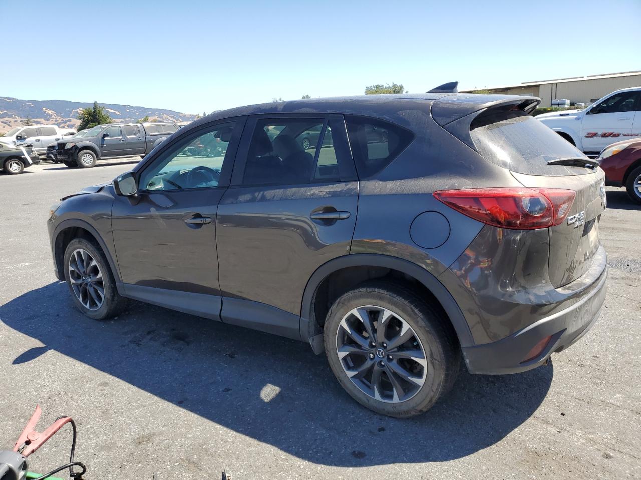 2016 Mazda CX-5 VIN JM3KE4DY3G0786590 Copart auction photo, front end / minor dent/scratches damage thumbnail 2