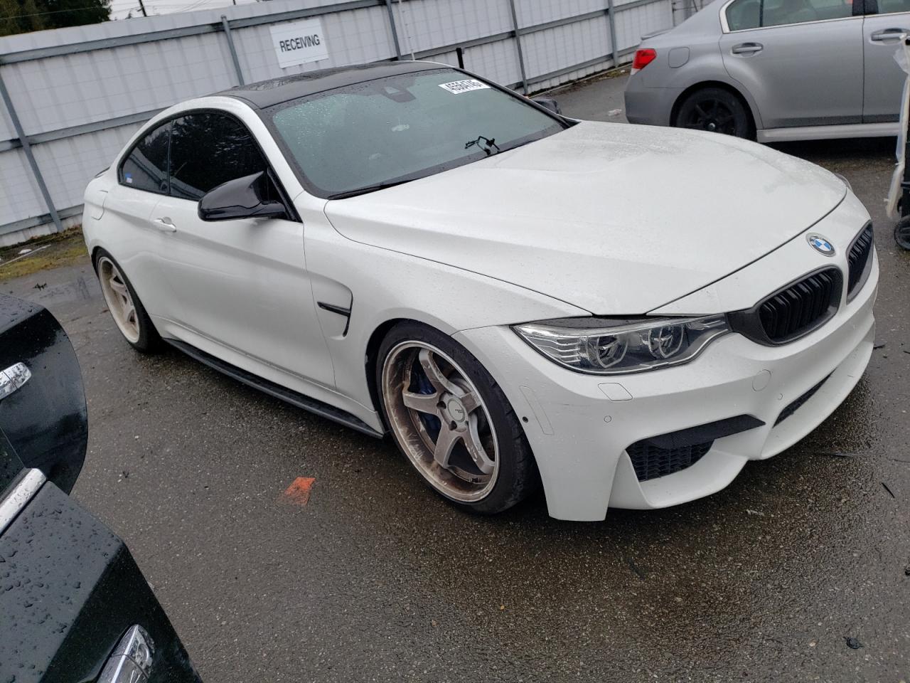 2015 BMW M4 VIN WBS3R9C53FK332387 Copart auction photo, rear end damage thumbnail 4