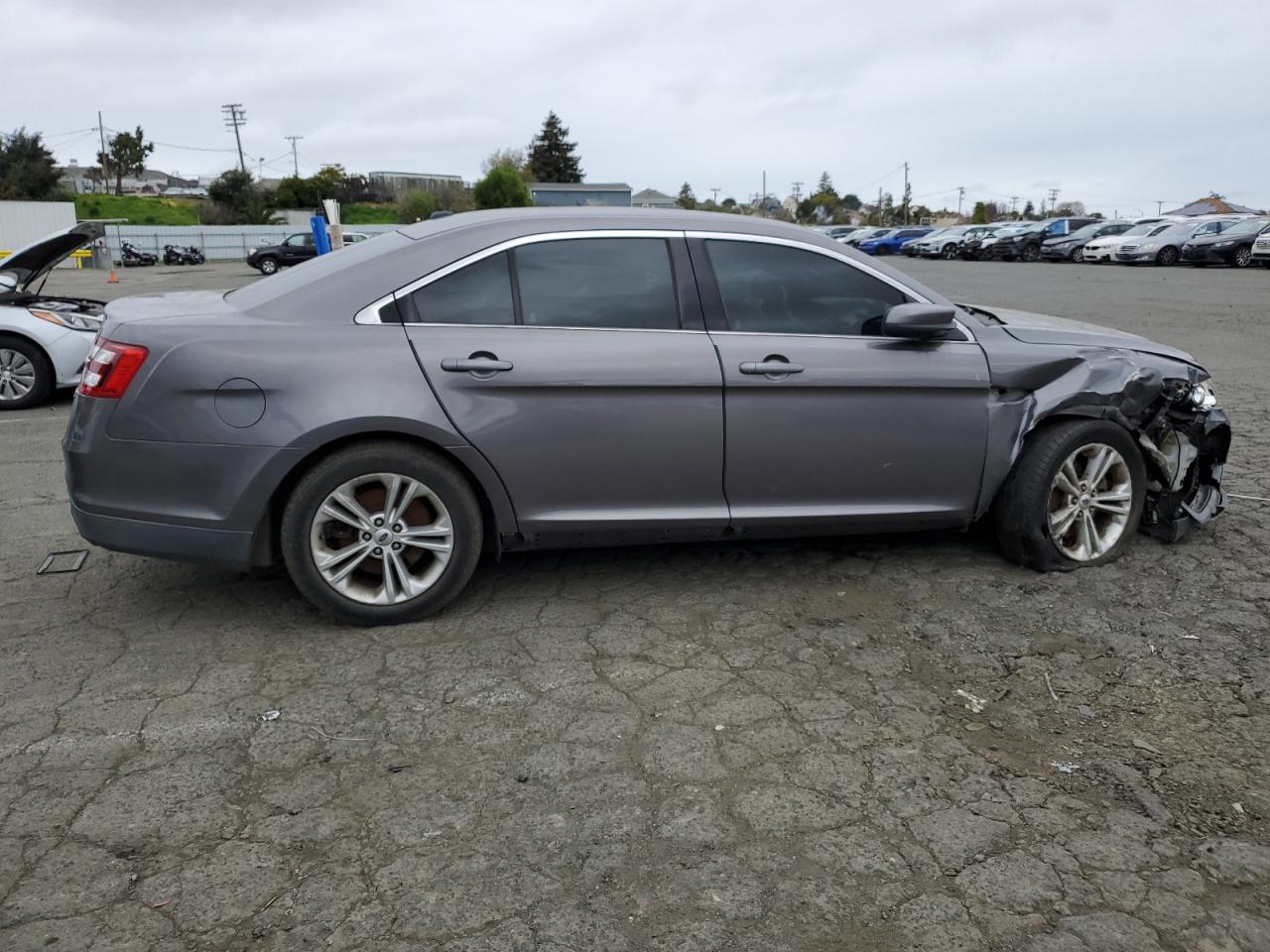2014 Ford Taurus VIN 1FAHP2E87EG137966 Copart auction photo, front end / all over damage thumbnail 3