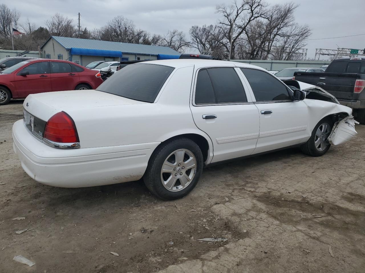2011 Ford Crown Victoria VIN 2FABP7EV4BX137356 Copart auction photo, front end damage thumbnail 3