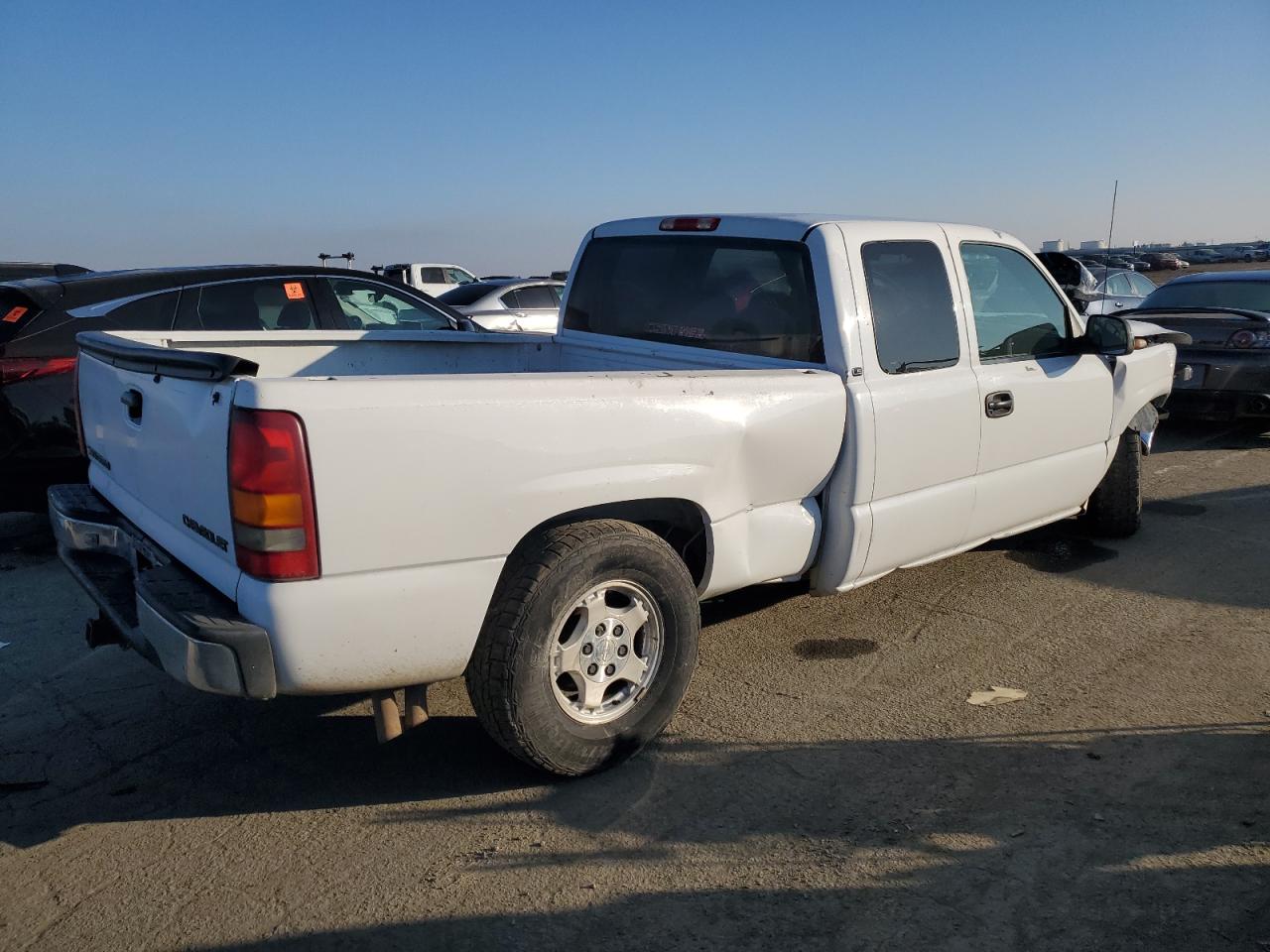 1999 Chevrolet Silverado VIN 2GCEC19T6X1161791 Copart auction photo, side / all over damage thumbnail 3