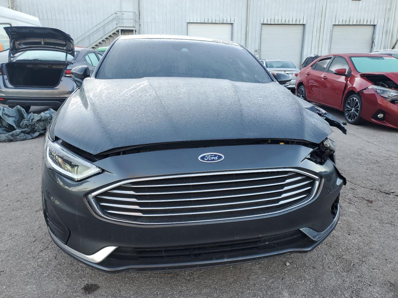 2020 Ford Fusion VIN 3FA6P0CD5LR151205 Copart auction photo, front end damage thumbnail 5