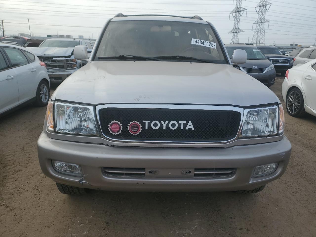 1999 Toyota Land Cruiser VIN JT3HT05JXX0040466 Copart auction photo, rear end / front end damage thumbnail 5