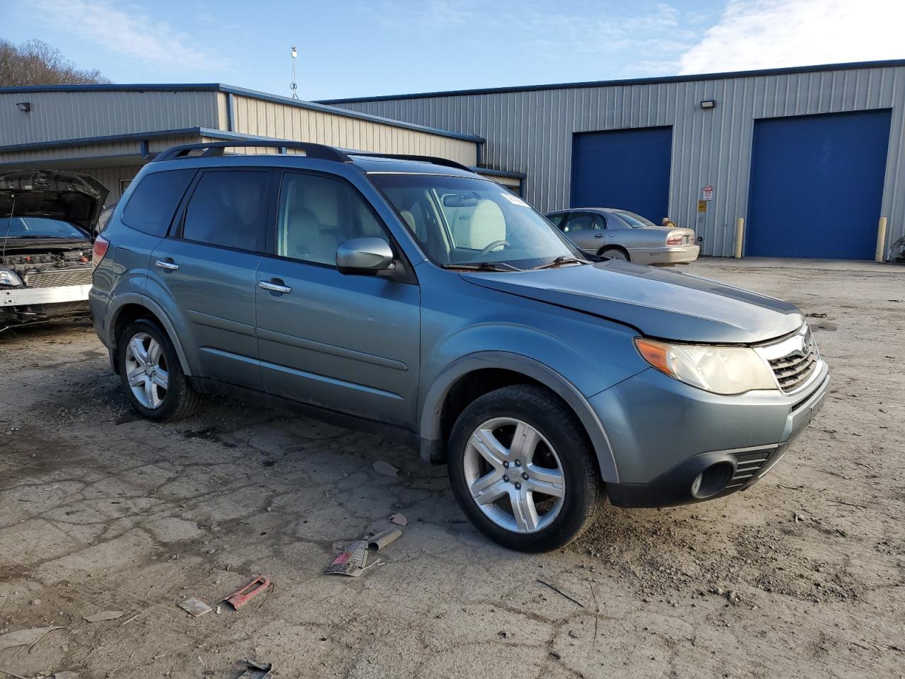 2009 Subaru Forester VIN JF2SH64699H742318 Copart auction photo, side / front end damage thumbnail 4