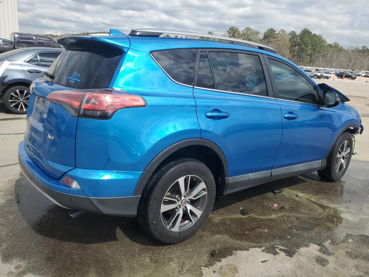 2017 Toyota RAV 4 VIN 2T3WFREV3HW404645 Copart auction photo, front end damage thumbnail 3