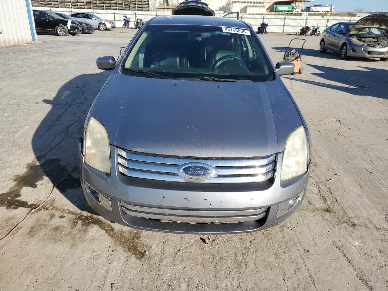 2007 Ford Fusion VIN 3FAHP08157R125569 Copart auction photo, side / front end damage thumbnail 5
