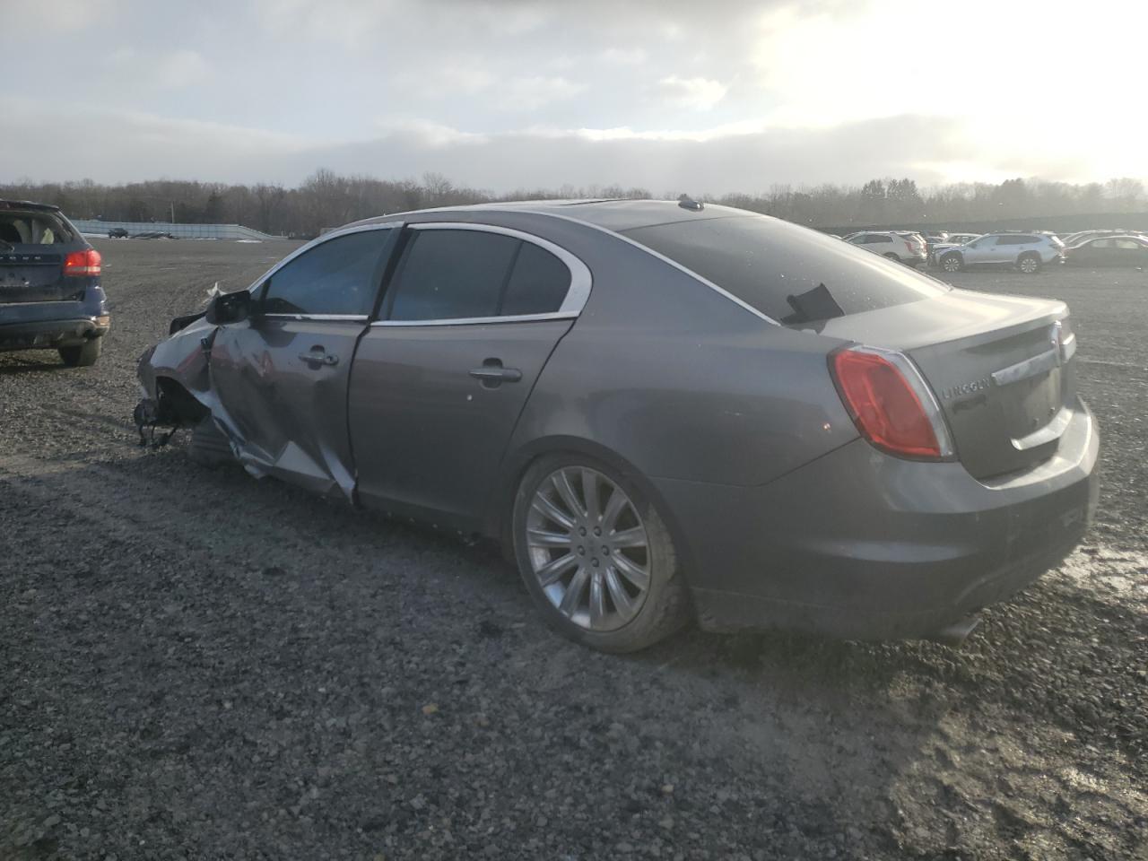 2011 Lincoln MKS VIN 1LNHL9ER9BG614685 Copart auction photo, front end / side damage thumbnail 2