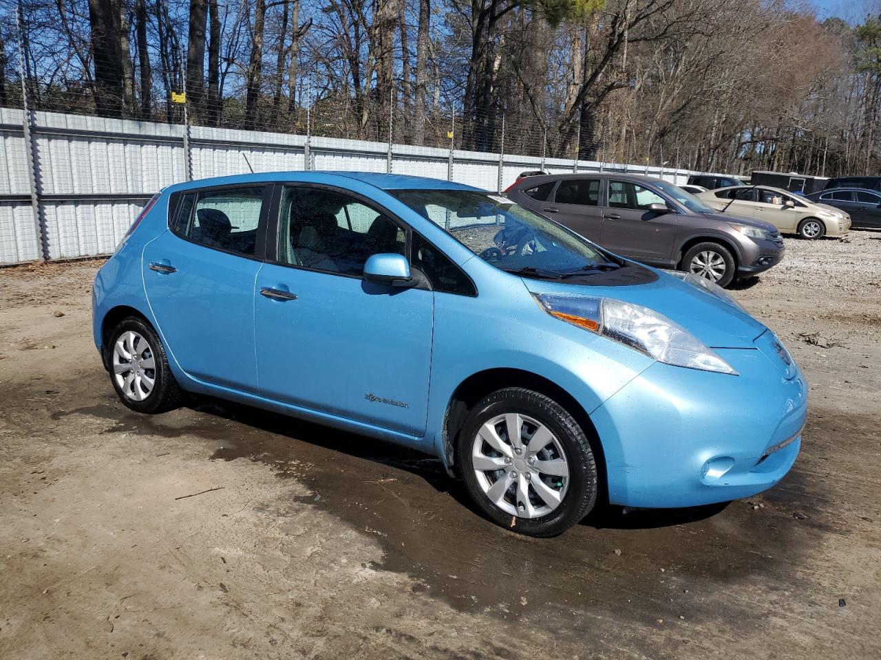 2015 Nissan Leaf VIN 1N4AZ0CPXFC329546 Copart auction photo, side / rear end damage thumbnail 4