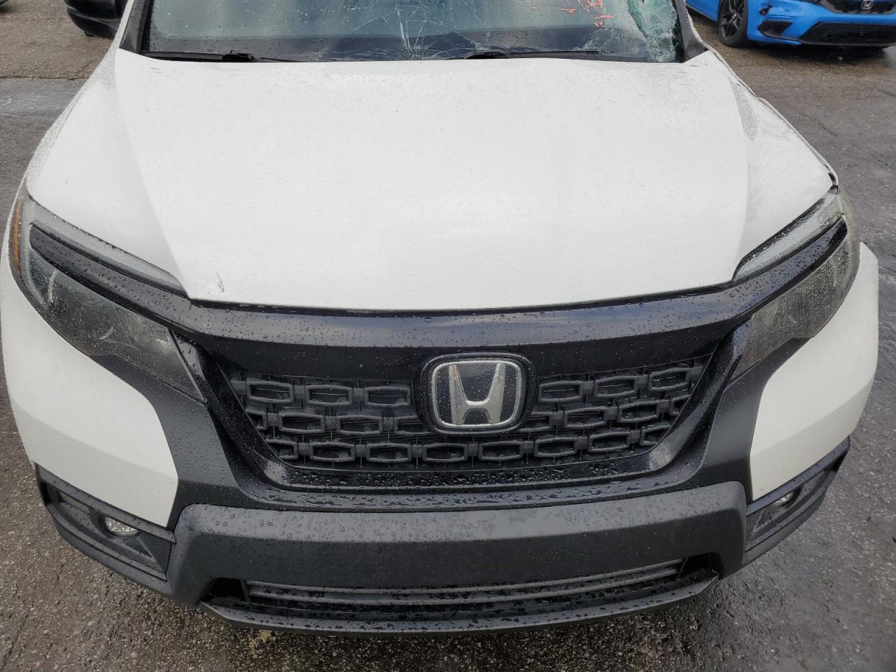 2020 Honda Passport VIN 5FNYF7H59LB003415 Copart auction photo, side / front end damage thumbnail 13