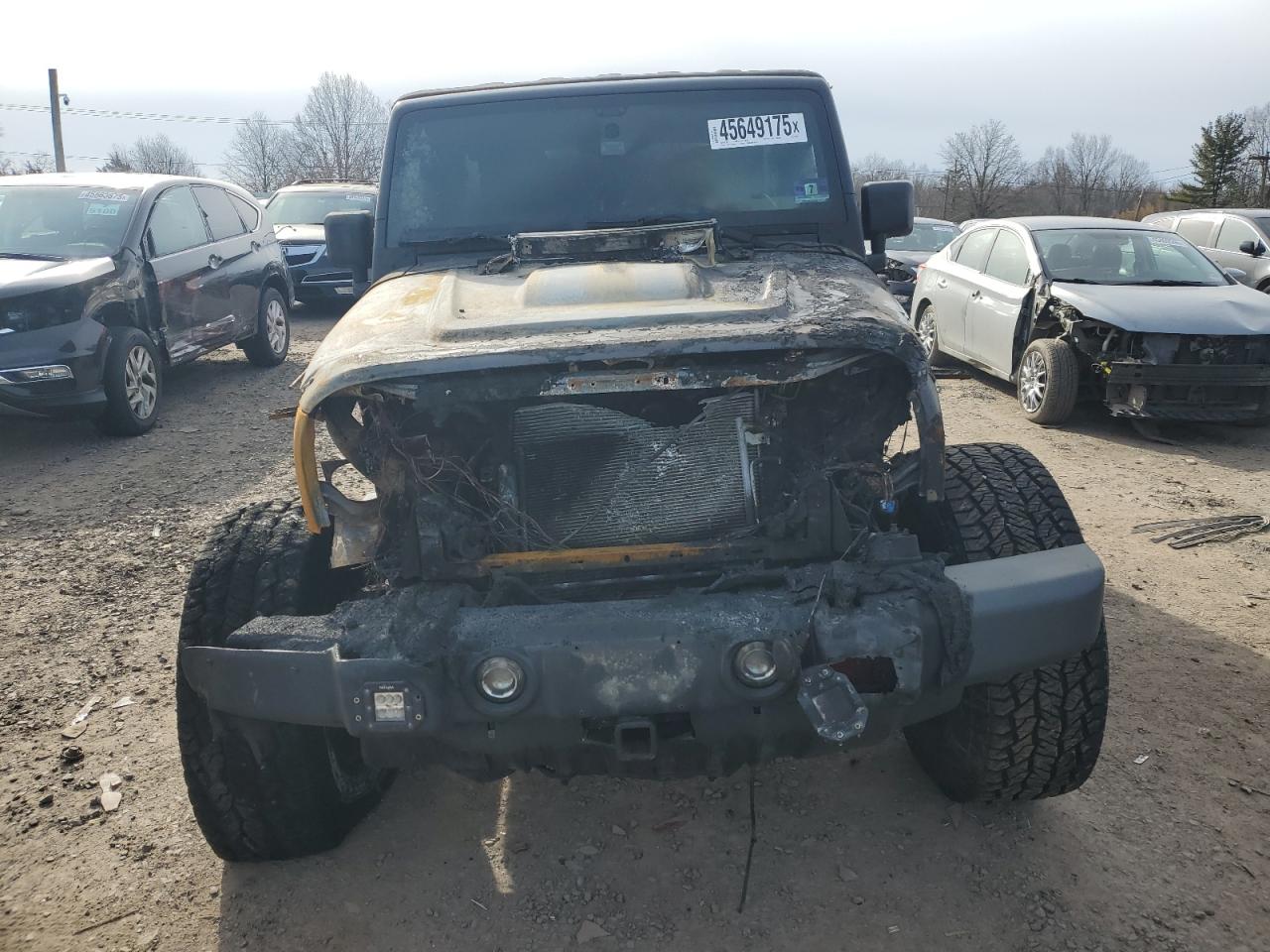 2011 Jeep Wrangler VIN 1J4BA3H19BL600502 Copart auction photo, burn damage thumbnail 5