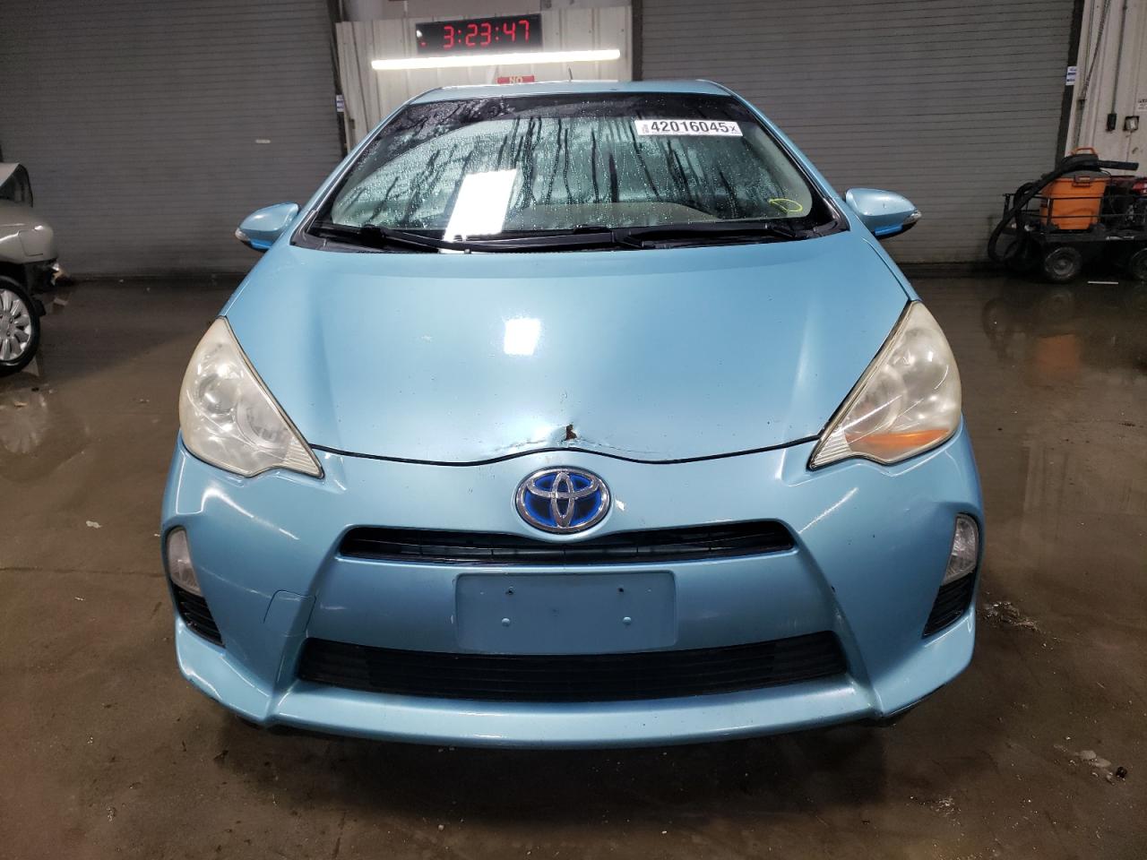 2014 Toyota Prius VIN JTDKDTB31E1070808 Copart auction photo, side / front end damage thumbnail 5