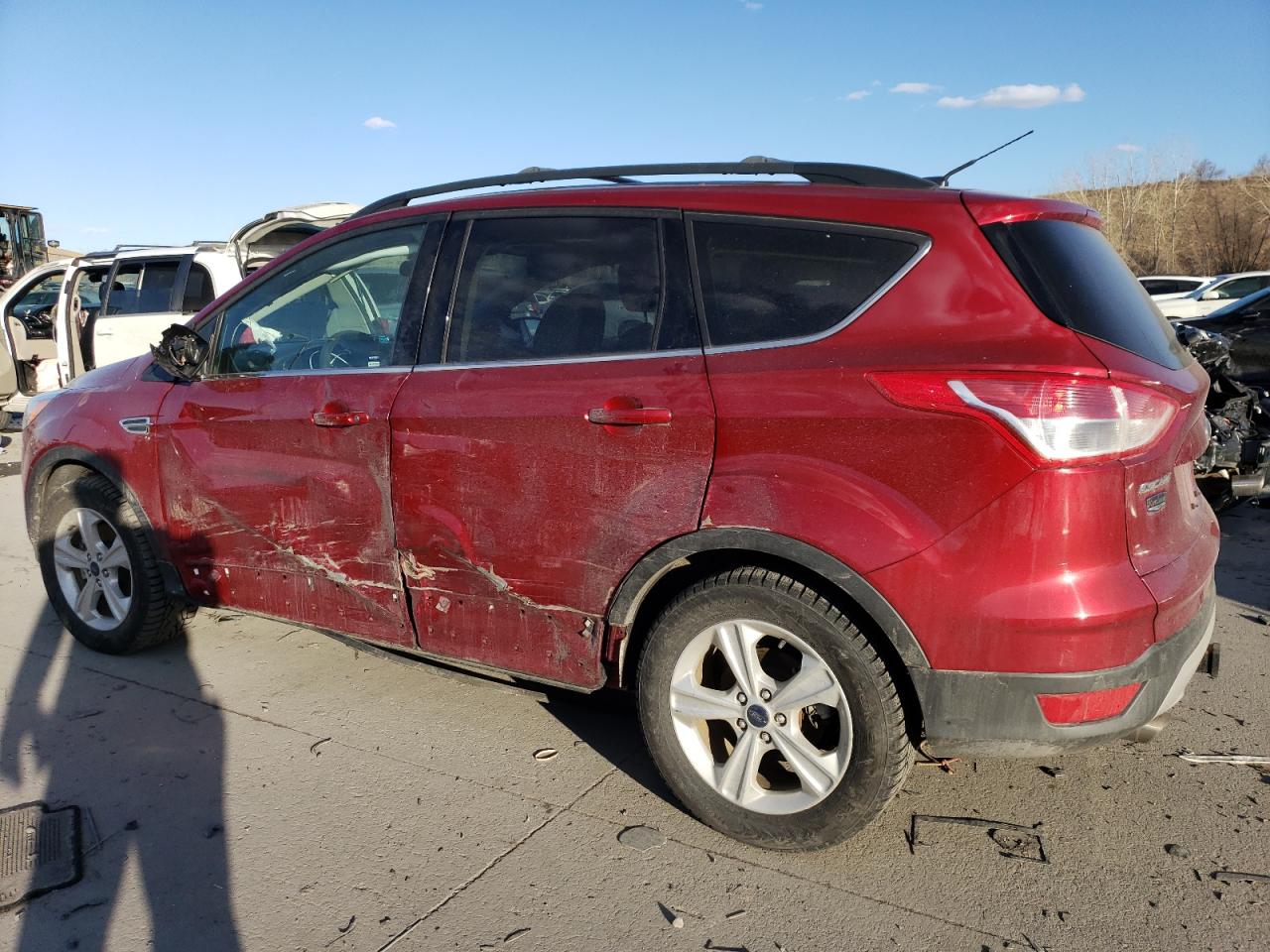 2016 Ford Escape VIN 1FMCU9G97GUC42955 Copart auction photo, side / rear end damage thumbnail 2