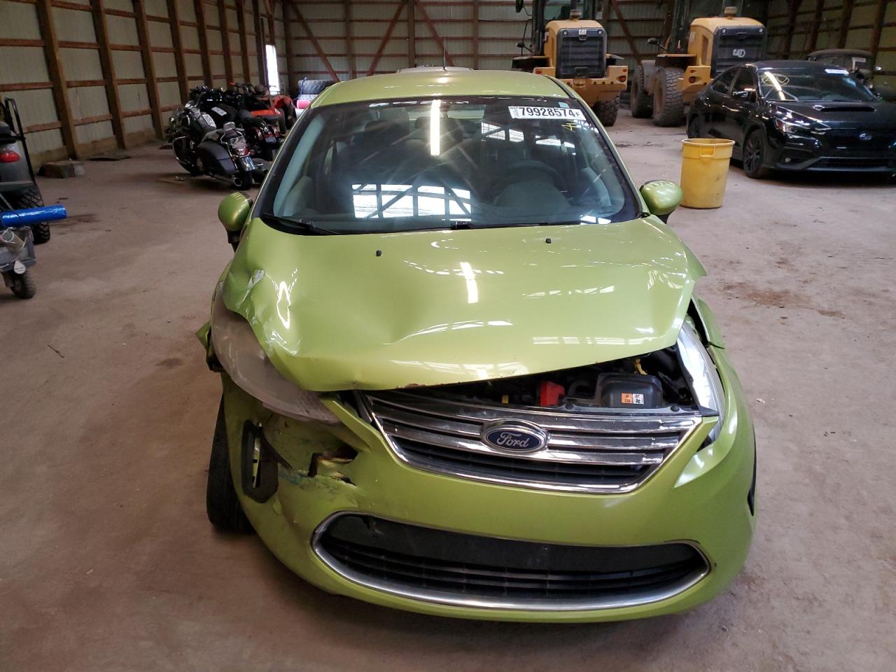 2012 Ford Fiesta VIN 3FADP4BJ2CM206650 Copart auction photo, front end / side damage thumbnail 5