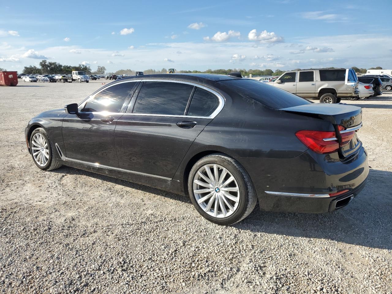 2016 BMW 7er VIN WBA7E2C56GG547064 Copart auction photo, rear end damage thumbnail 2