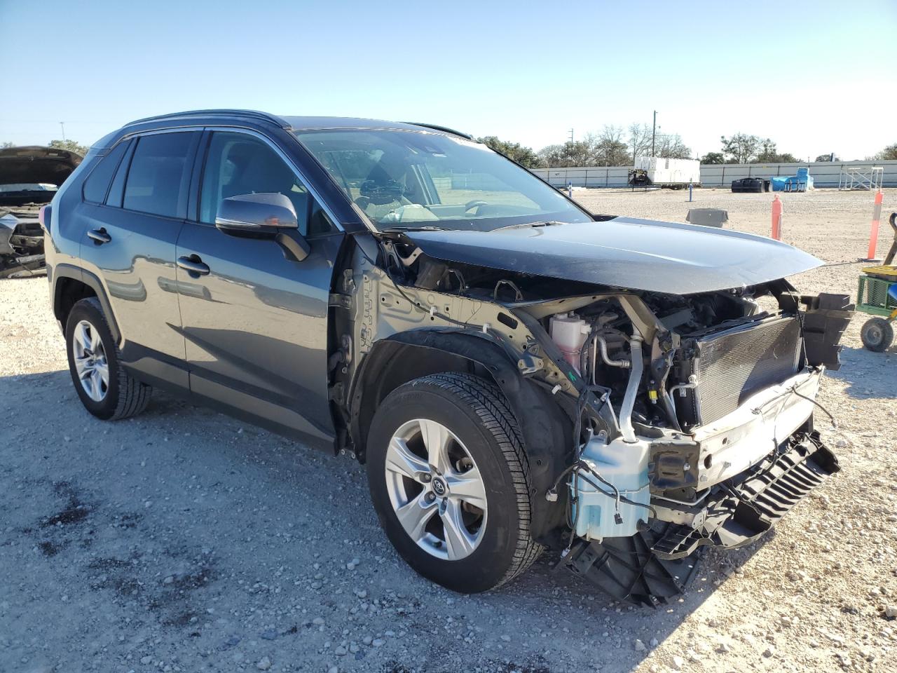 2021 Toyota RAV 4 VIN 2T3W1RFV3MC097096 Copart auction photo, front end / side damage thumbnail 4