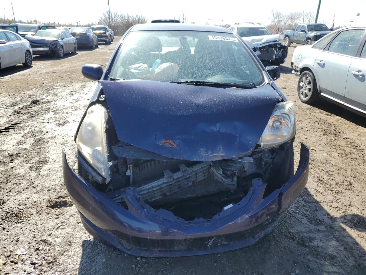 2009 Honda Fit VIN JHMGE884X9S075004 Copart auction photo, front end / side damage thumbnail 5