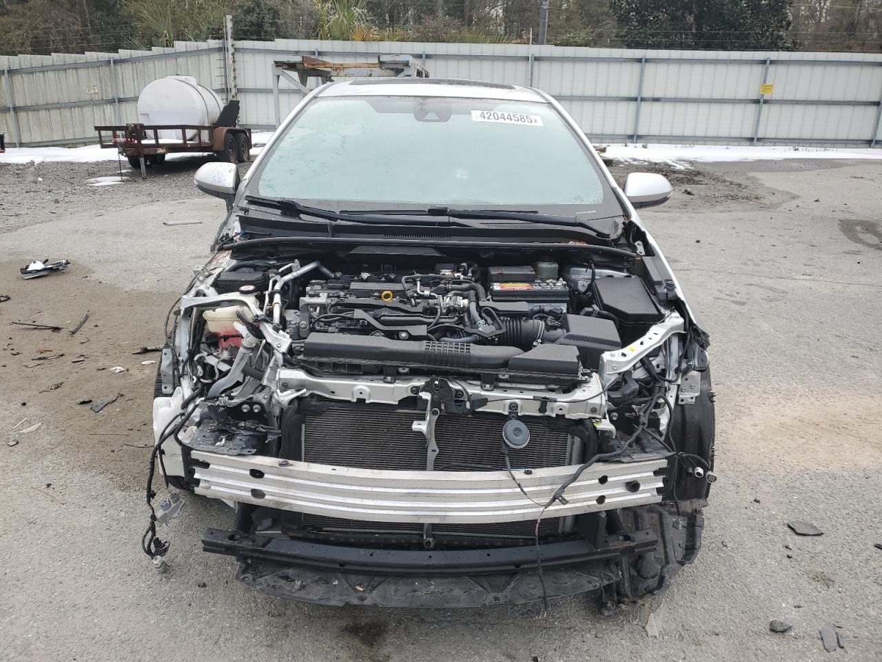 2020 Toyota Corolla VIN JTDT4RCE1LJ010449 Copart auction photo, front end / side damage thumbnail 5