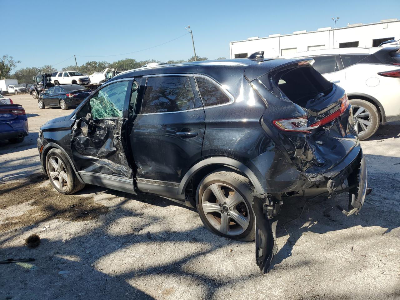 2018 Lincoln MKC VIN 5LMCJ1C9XJUL13604 Copart auction photo, side / rear end damage thumbnail 2