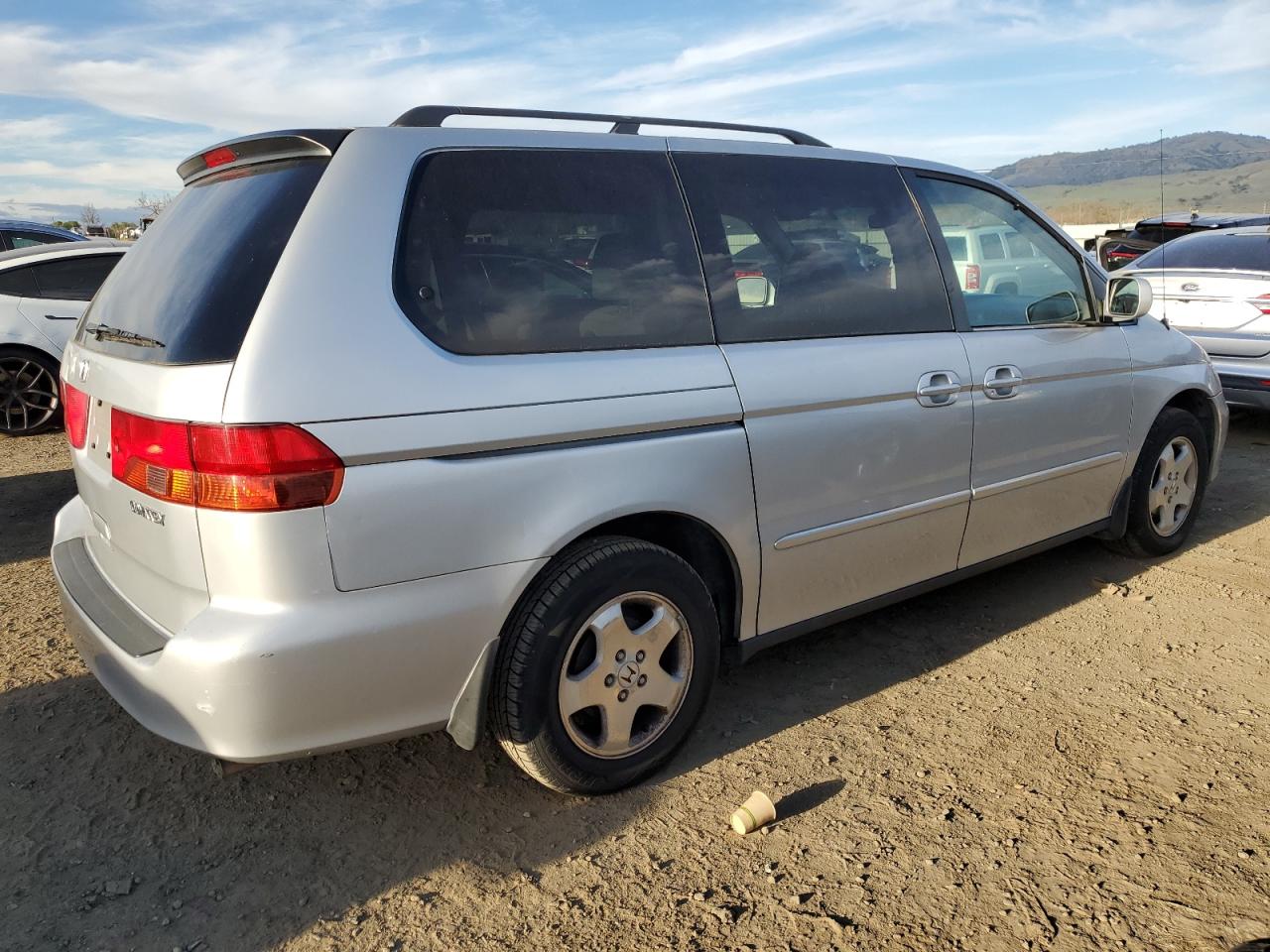 2001 Honda Odyssey VIN 2HKRL18601H565673 Copart auction photo, vandalism damage thumbnail 3