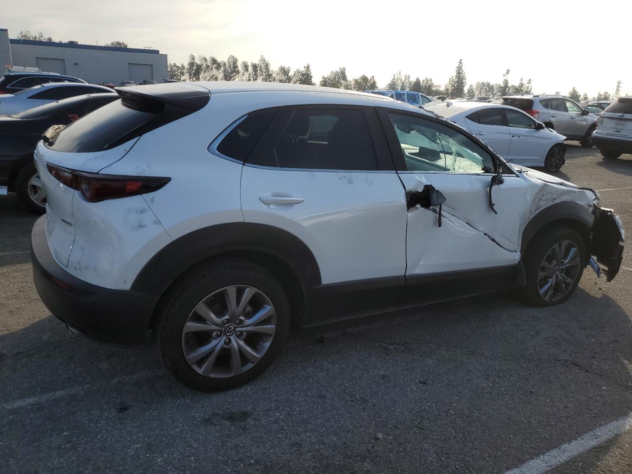 2021 Mazda CX-30 VIN 3MVDMABL4MM229544 Copart auction photo, front end / top/roof damage thumbnail 3
