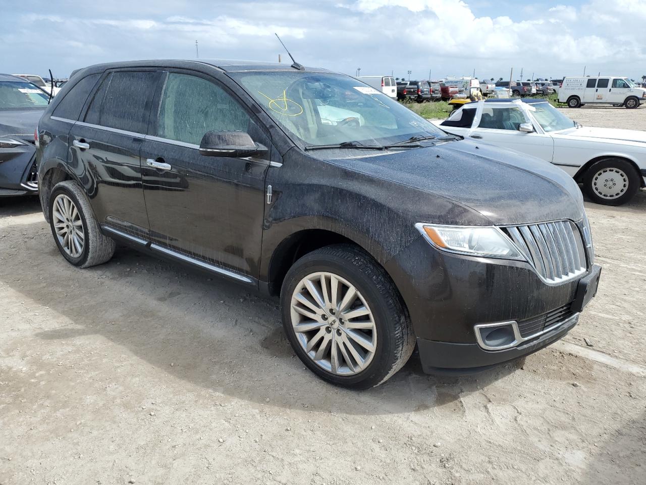 2015 Lincoln MKX VIN 2LMDJ8JKXFBL32001 Copart auction photo, water/flood damage thumbnail 4