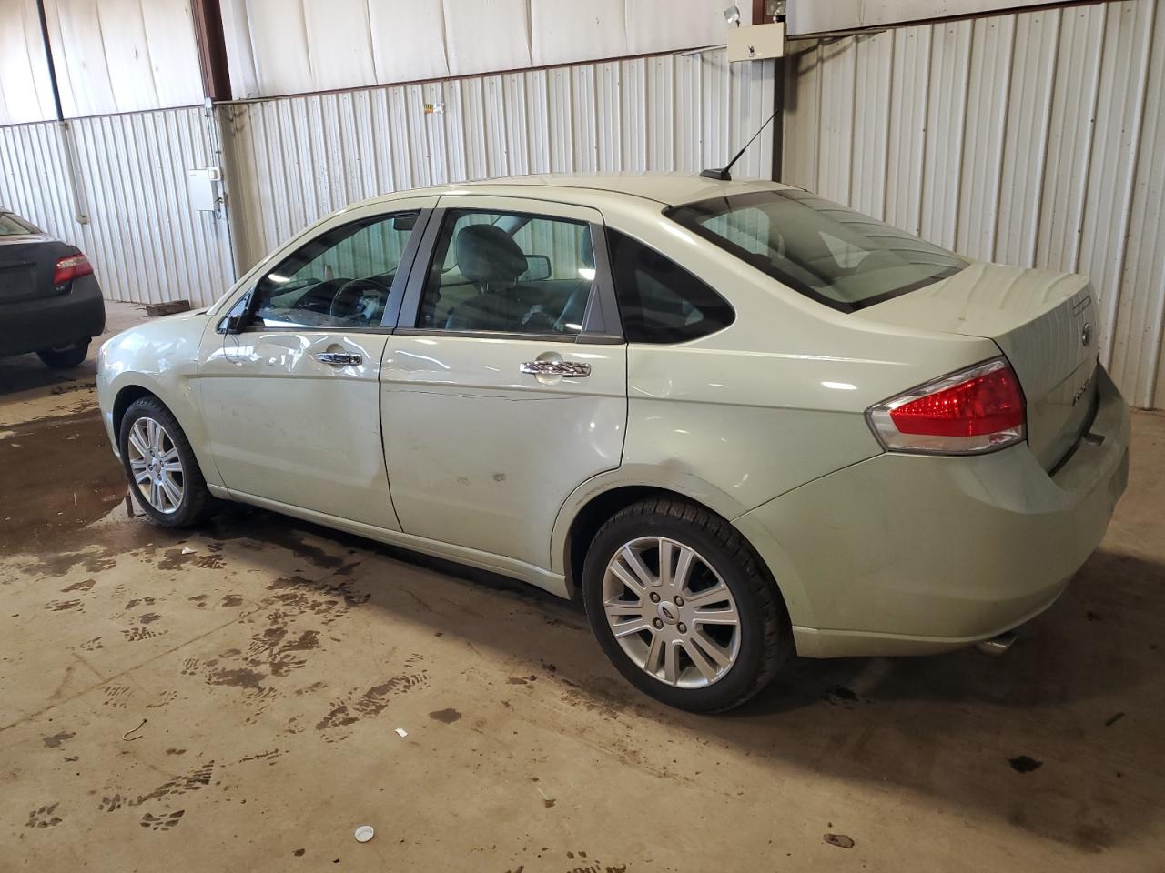 2011 Ford Focus VIN 1FAHP3HN4BW132314 Copart auction photo, side / rear end damage thumbnail 2
