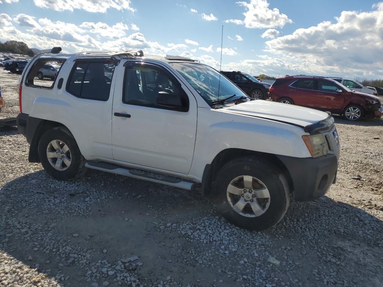 2010 Nissan XTerra VIN 5N1AN0NW1AC519895 Copart auction photo, rollover / undercarriage damage thumbnail 4