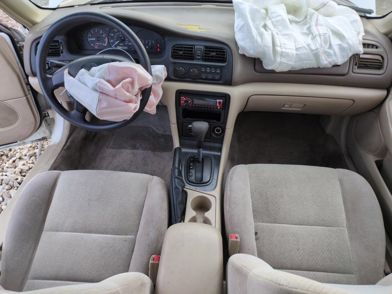 1999 Mazda 626 VIN 1YVGF22C9X5887587 Copart auction photo, rear end / side damage thumbnail 8