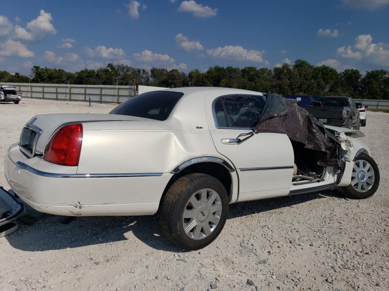 2003 Lincoln Town Car VIN 1LNHM83W53Y616042 Copart auction photo, all over damage thumbnail 3