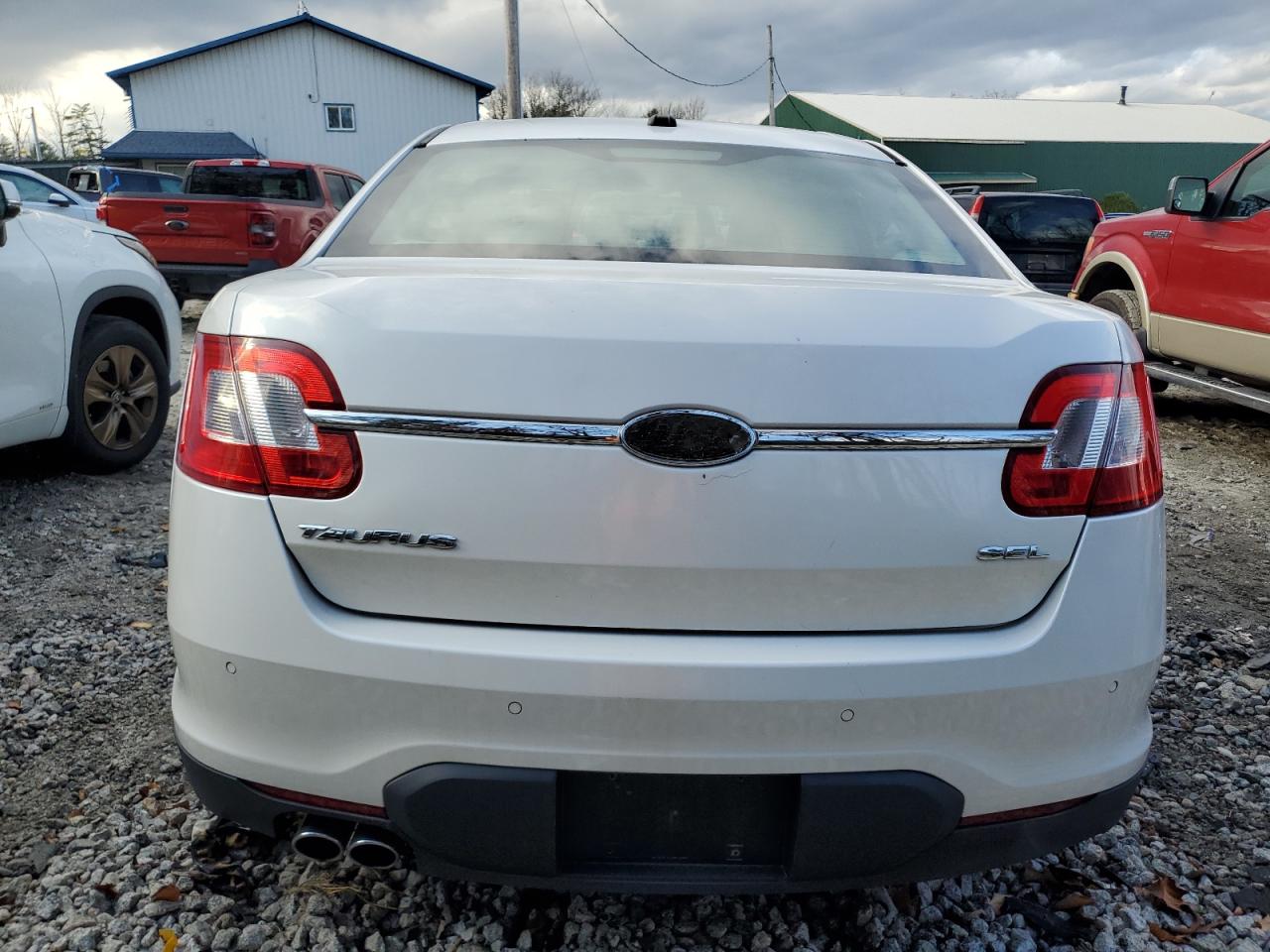 2011 Ford Taurus VIN 1FAHP2EWXBG112005 Copart auction photo, vandalism / side damage thumbnail 6