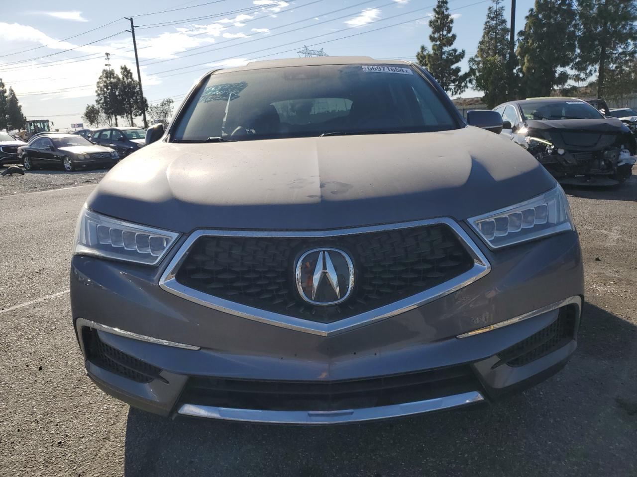 2020 Acura MDX VIN 5J8YD3H5XLL003940 Copart auction photo, front end / vandalism damage thumbnail 5
