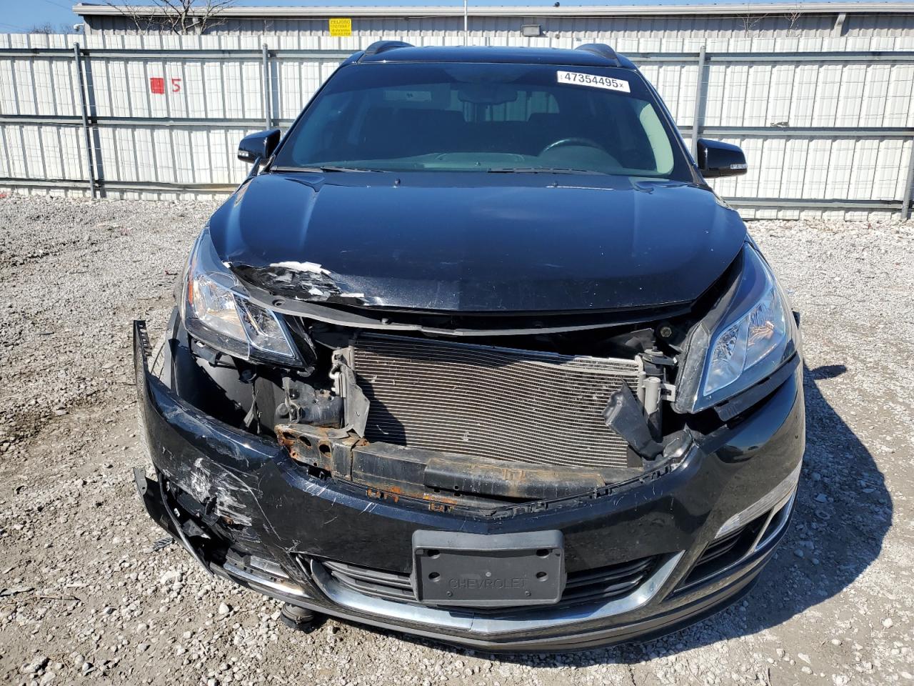 2017 Chevrolet Traverse VIN 1GNKRGKD0HJ287649 Copart auction photo, front end / minor dent/scratches damage thumbnail 5