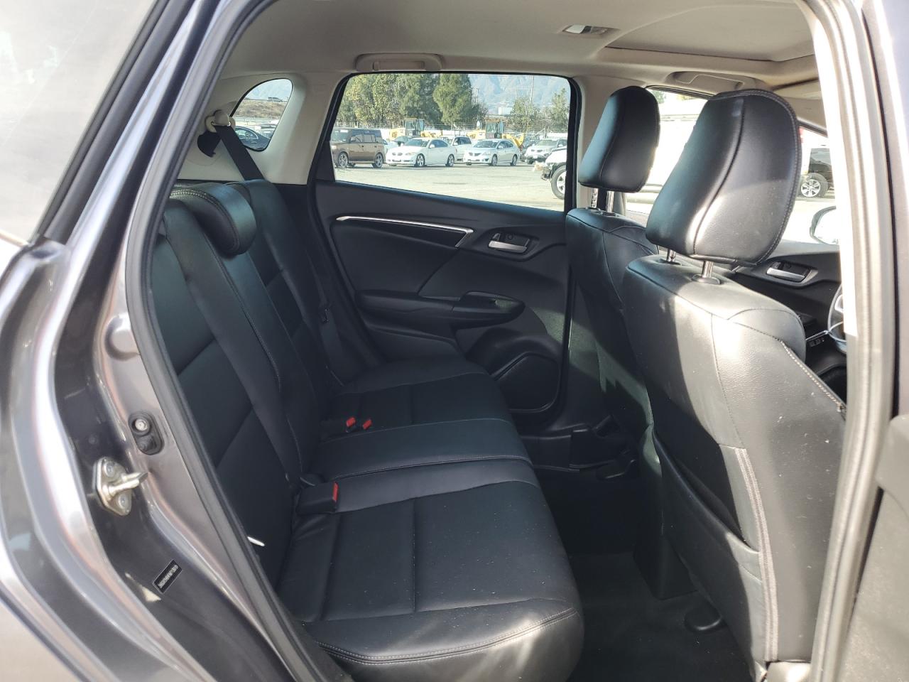 2015 Honda Fit VIN 3HGGK5H84FM713619 Copart auction photo, side / front end damage thumbnail 11