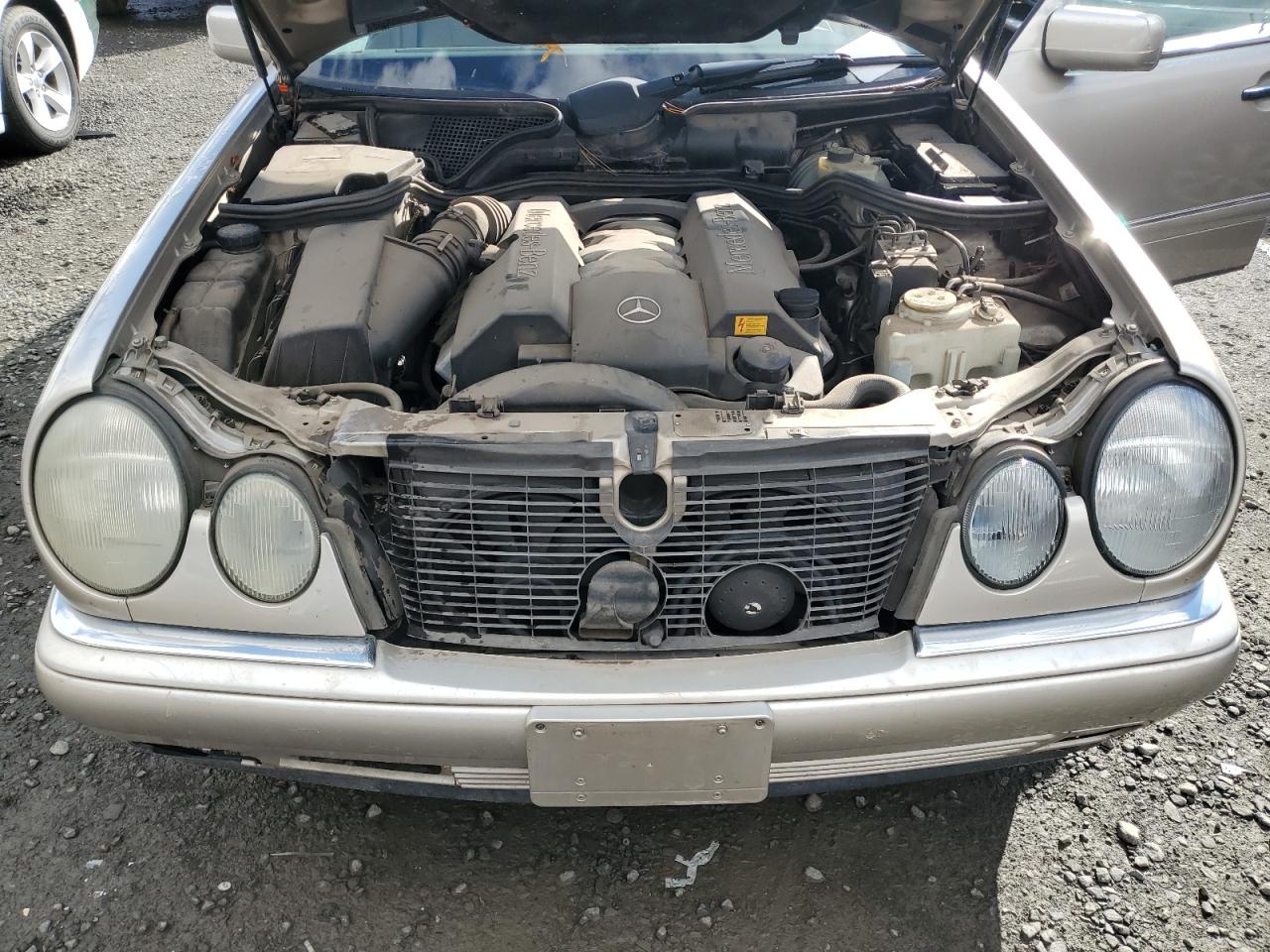 1999 Mercedes-Benz E-klasse VIN WDBJF70H2XA874368 Copart auction photo, front end / undercarriage damage thumbnail 11