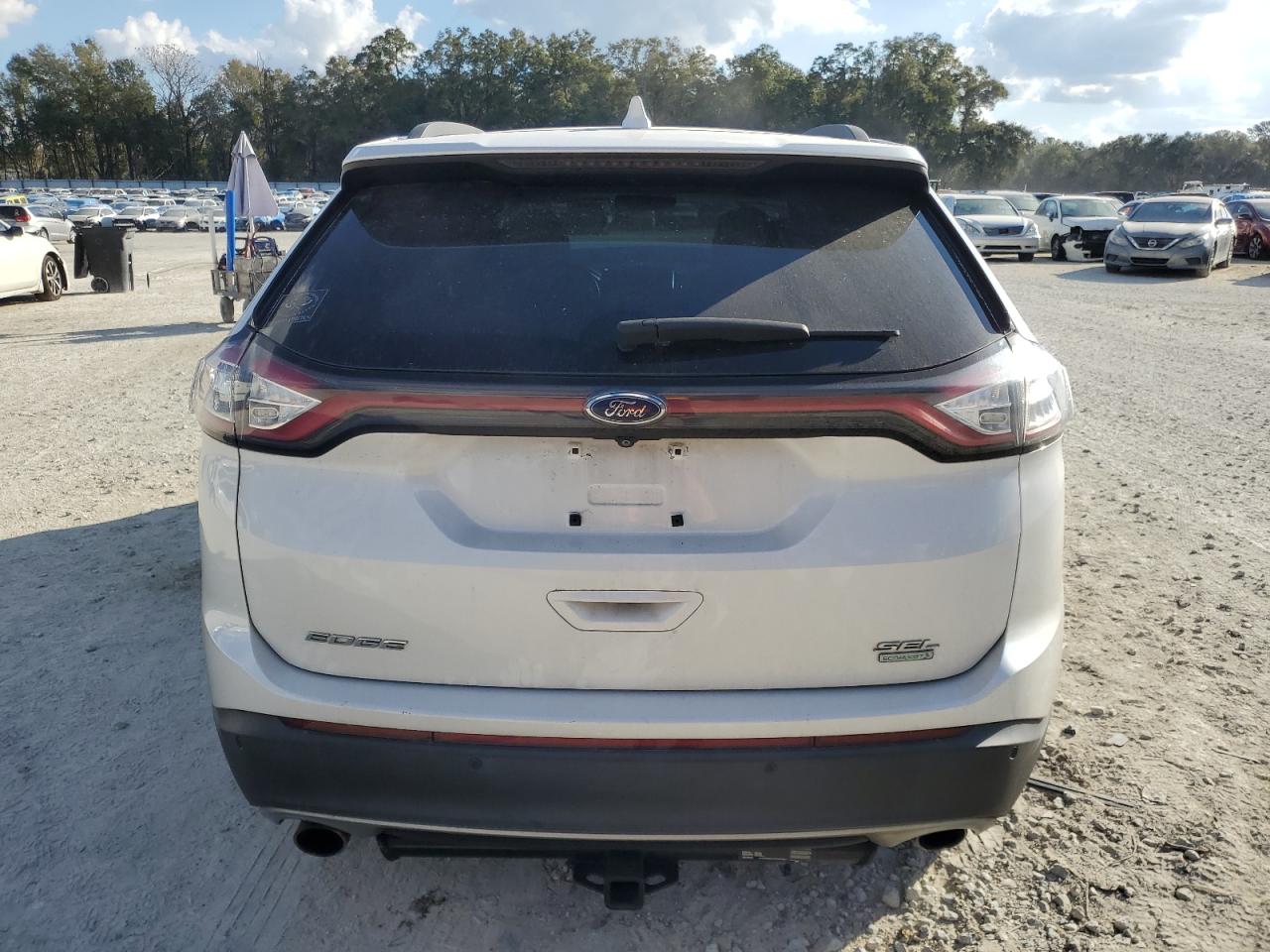 2015 Ford Edge VIN 2FMTK3J93FBC16899 Copart auction photo, front end / minor dent/scratches damage thumbnail 6