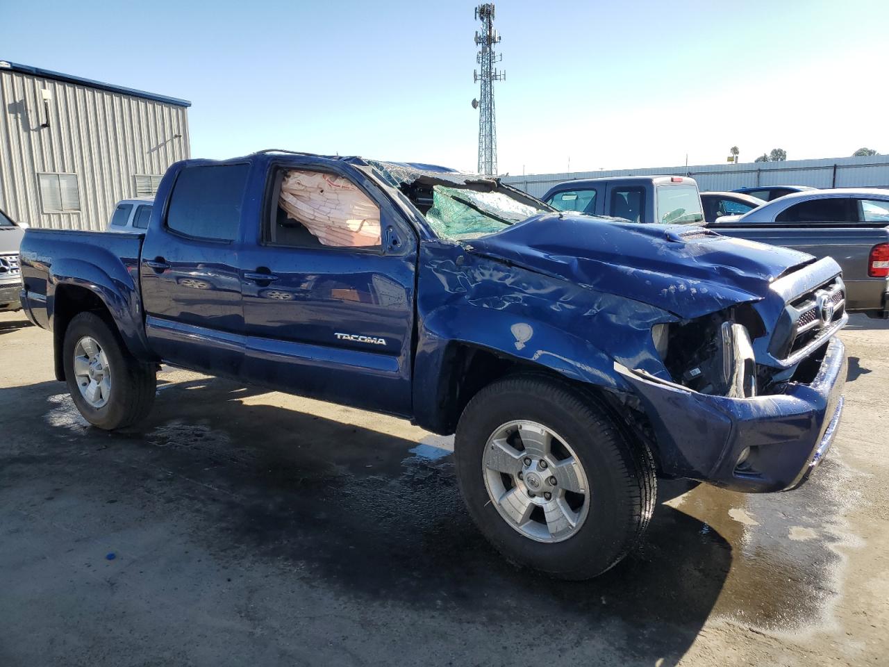 2014 Toyota Tacoma VIN 3TMLU4EN0EM159456 Copart auction photo, rollover damage thumbnail 4