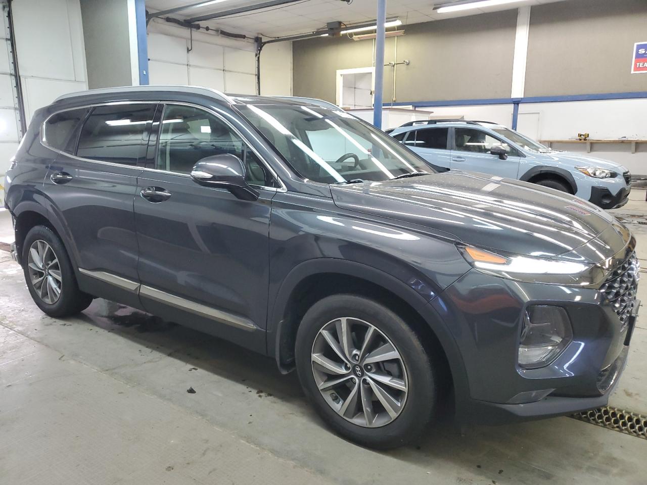 2020 Hyundai Santa Fe VIN 5NMS5CAD0LH269133 Copart auction photo, rear end damage thumbnail 4