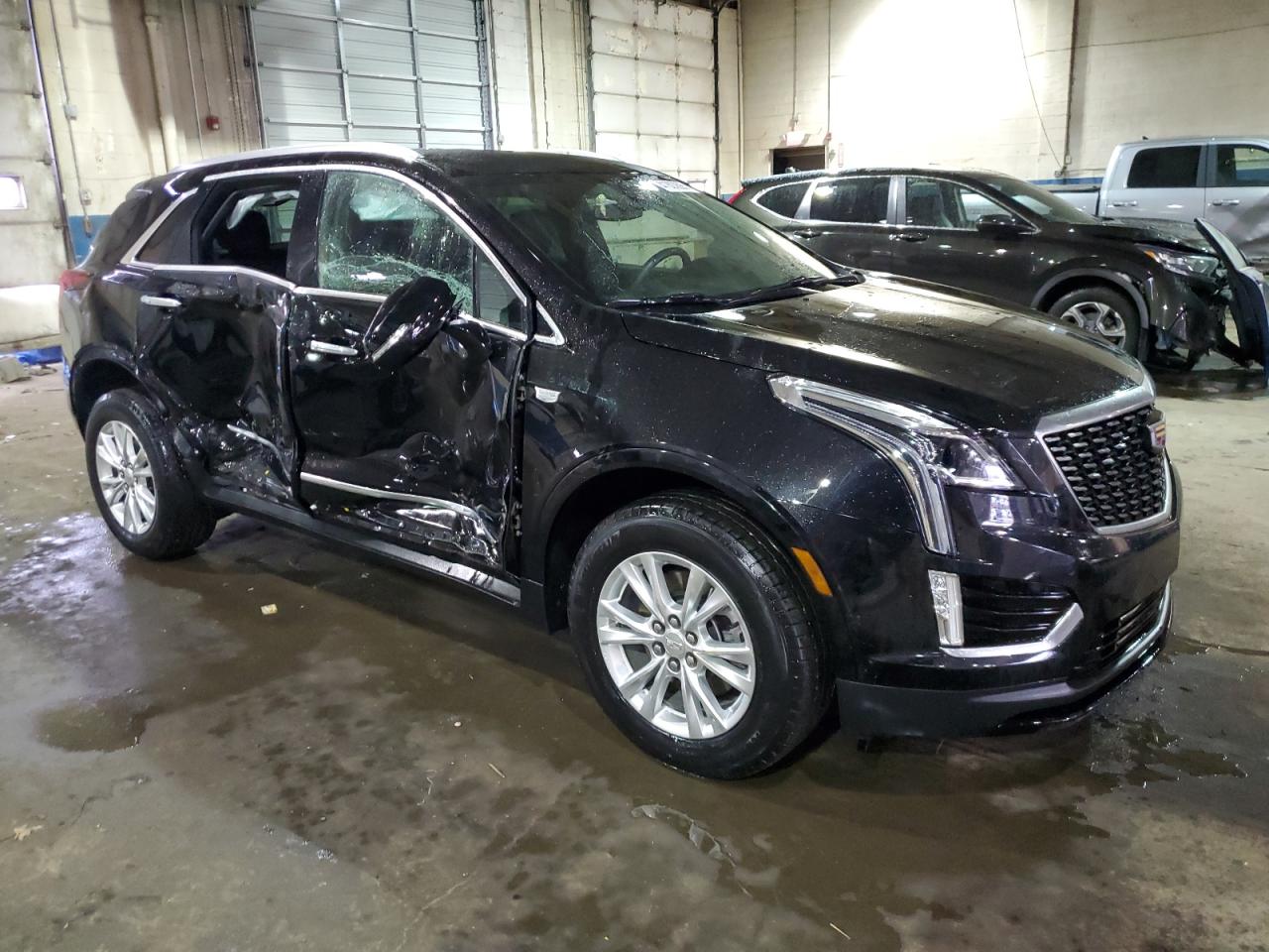 2022 Cadillac XT5 VIN 1GYKNBR46NZ173918 Copart auction photo, side damage thumbnail 4