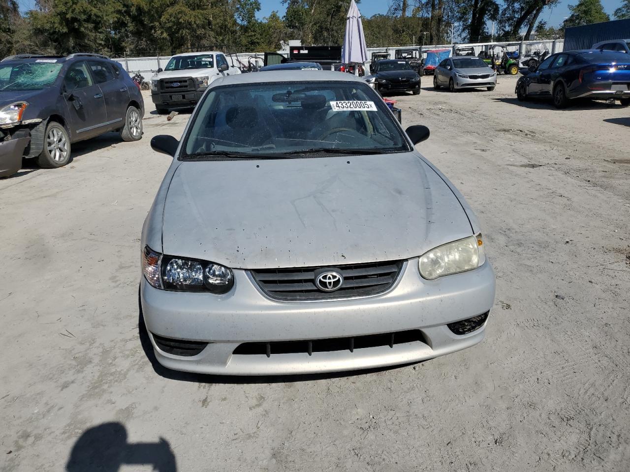 2001 Toyota Corolla VIN 1NXBR12E11Z466703 Copart auction photo, rear end damage thumbnail 5